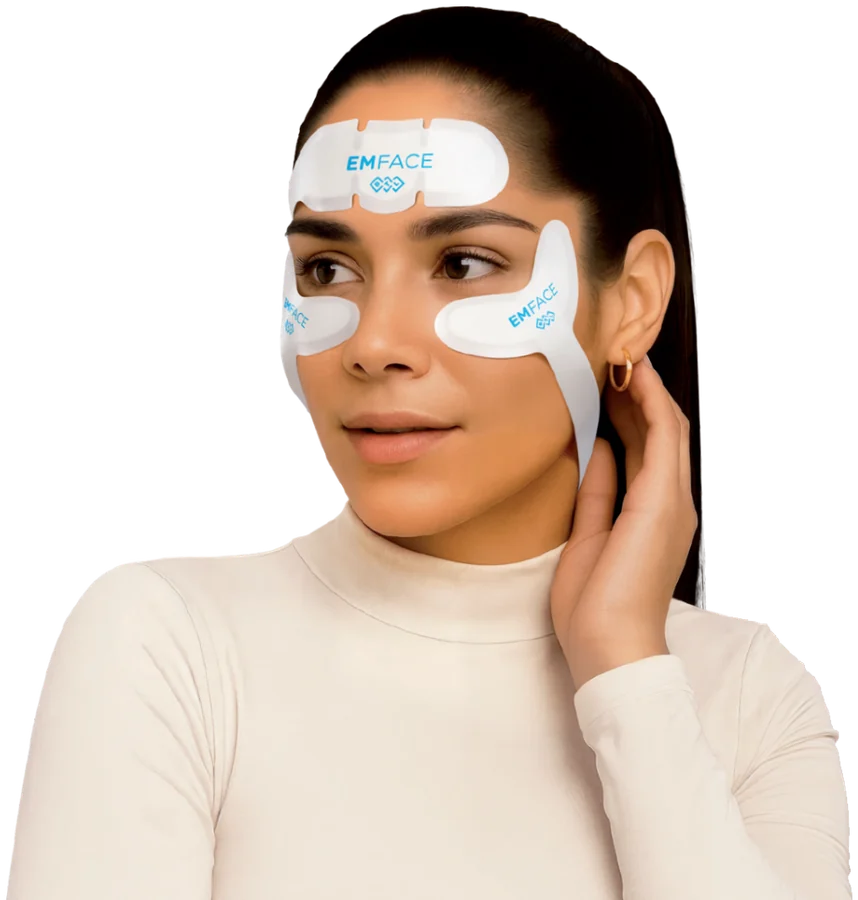 A client wearing the BTL EMFACE applicators during treatment at CANVAS Medical Clinic, Penang