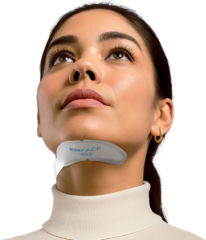 A client wearing the BTL EMFACE Submentum applicator under her chin during double chin treatment at CANVAS Medical Clinic, Penang