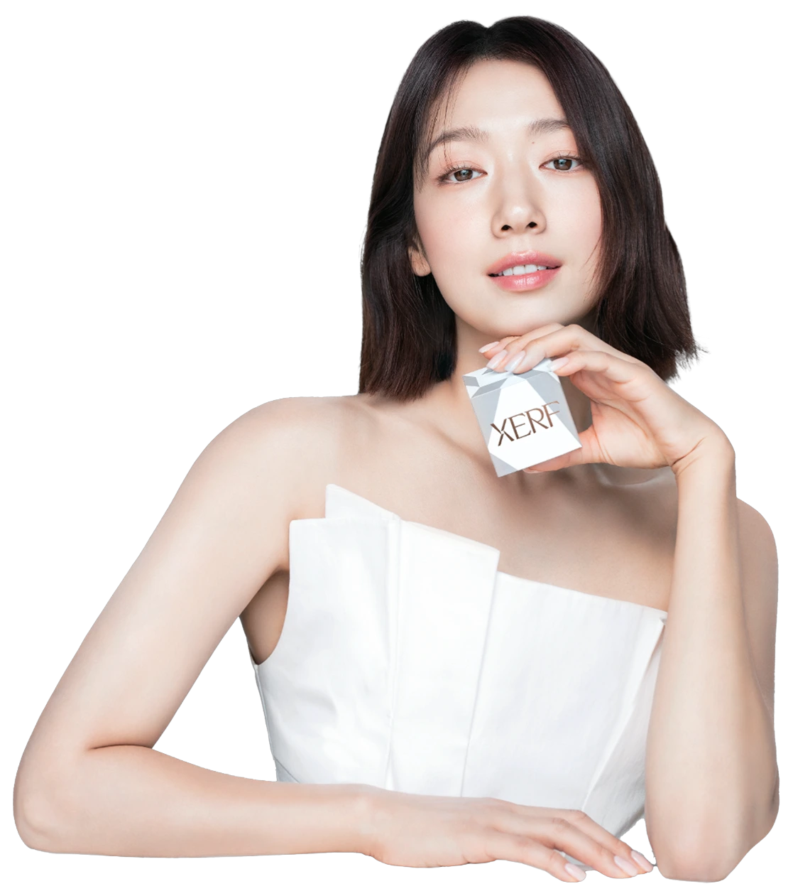 XERF ambassador Shinhye Park holding the XERF box at CANVAS Medical Clinic, Penang